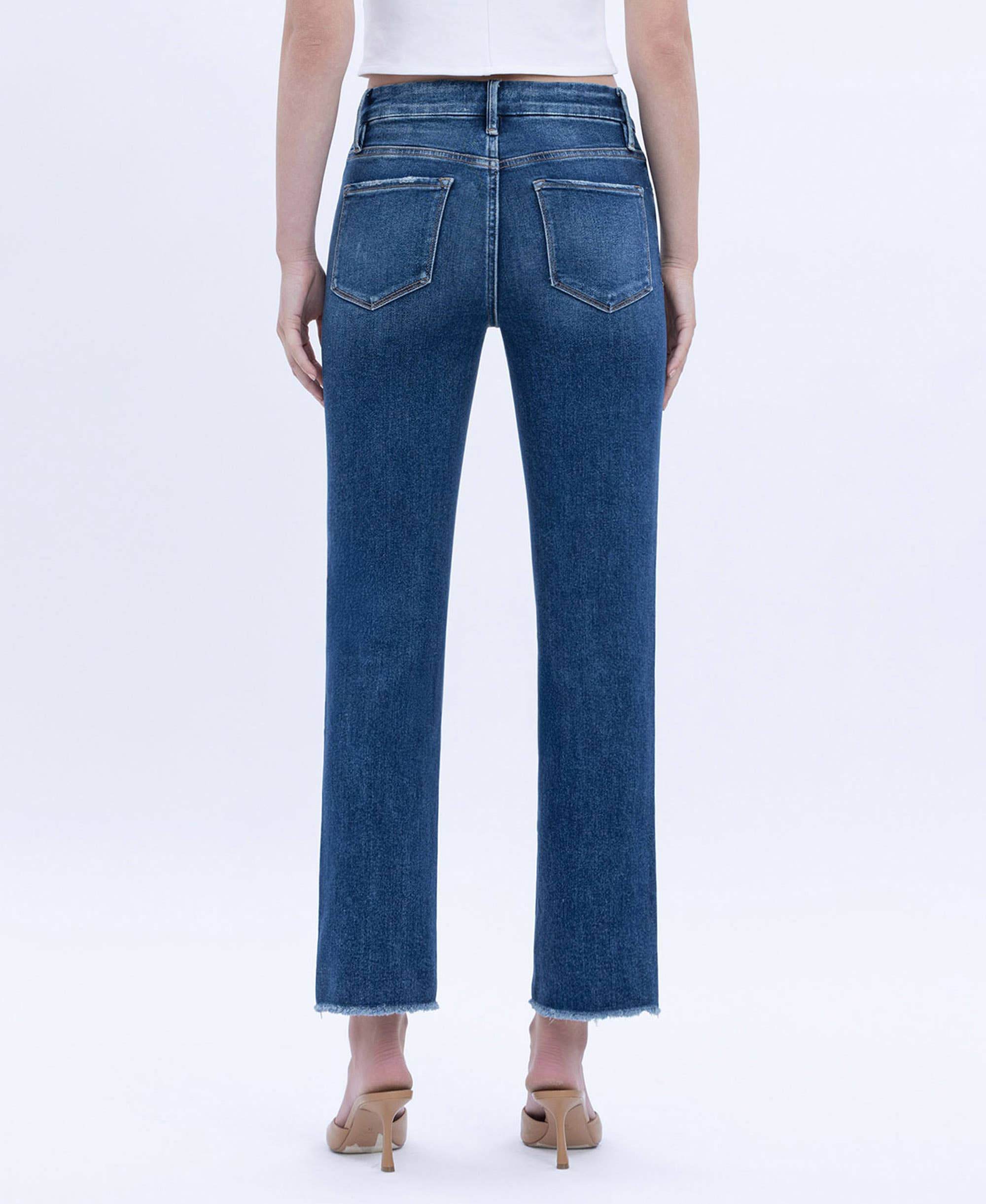 HIGH RISE RAW SLANT HEM SLIM STRAIGHT JEANS