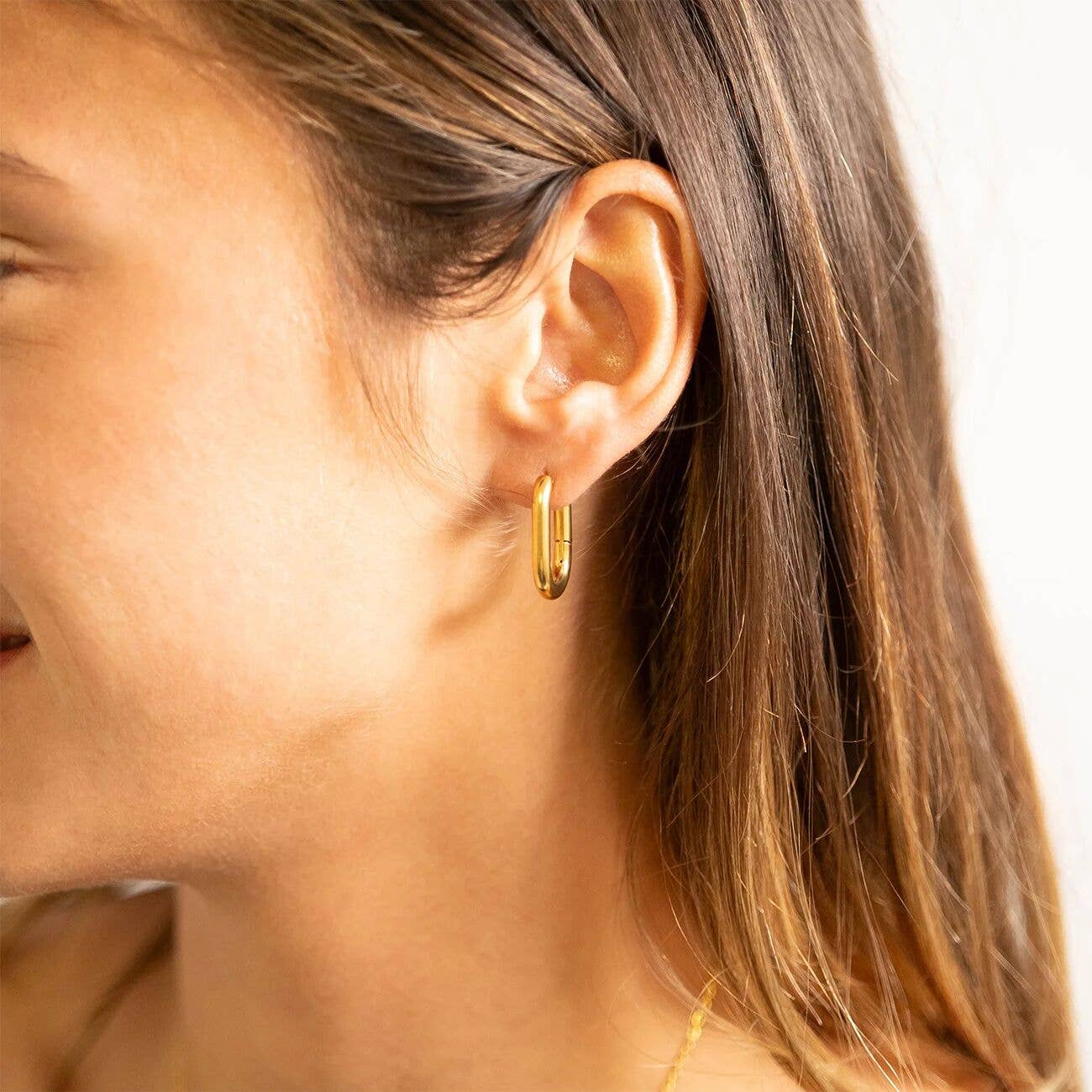 18K Gold Oval Huggie Earrings