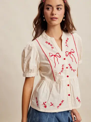 Embroidered Bow Peplum Top