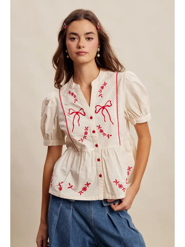 Embroidered Bow Peplum Top