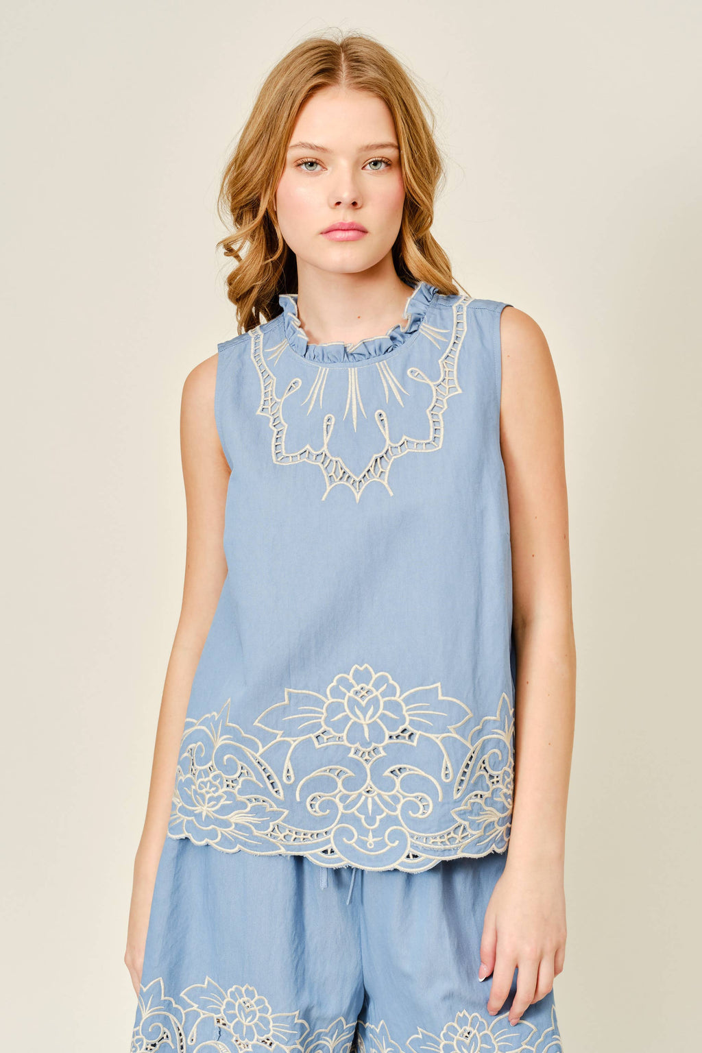 EMBROIDERED RUFFLE NECK SLEEVELESS BLOUSE