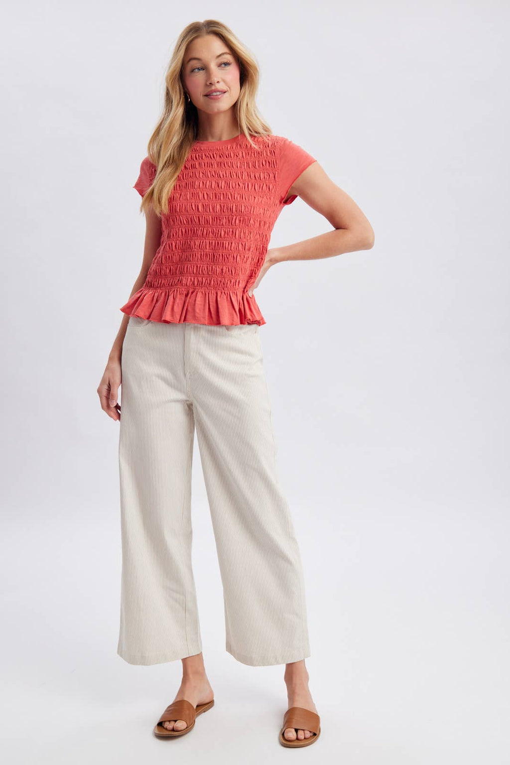 SMOCKED RUFFLE HEM KNIT TOP