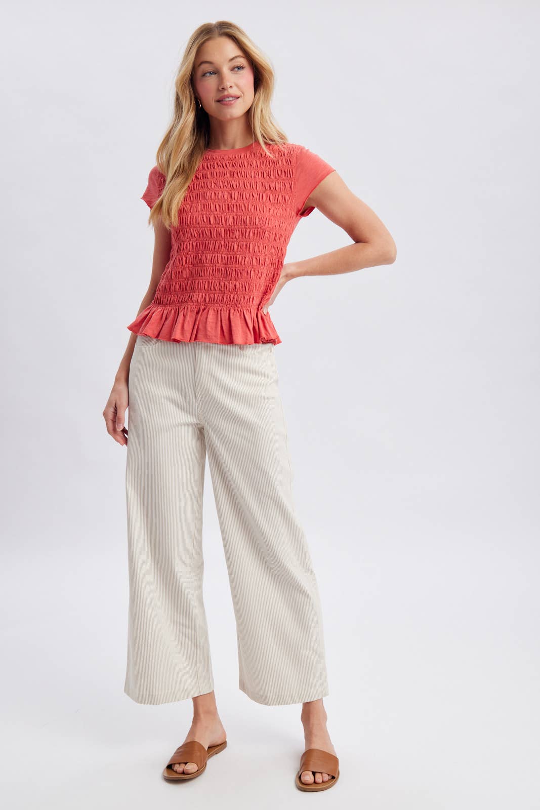 SMOCKED RUFFLE HEM KNIT TOP